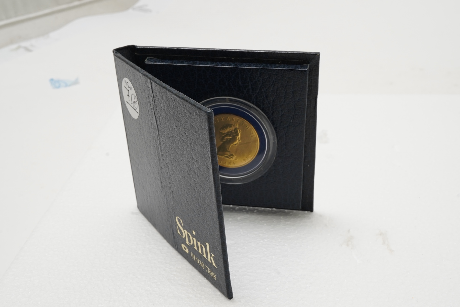 An Elizabeth II gold Canadian 50 dollar coin, 1982